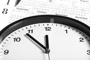 Calendar and Clock on White Background