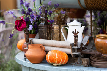 Autumn decoration with pumpkins and flowers on the street of the European city