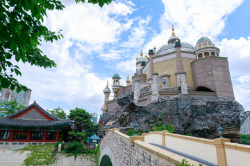 Lotte World amusement theme park around Seokchon lake, a major tourist attraction in Seoul, South Korea.