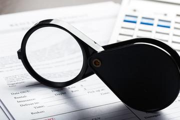 Magnifying Glass and document close up