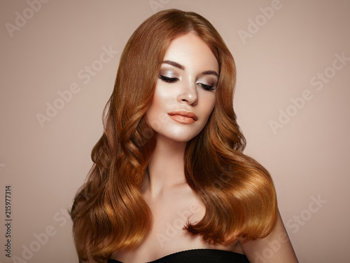 Redhead Girl With Long Healthy And Shiny Curly Hair Care