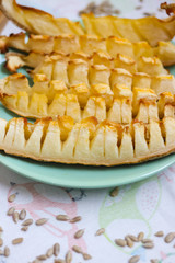 Dried melon. Asian traditional sweets and Arabic dessert dried in oven. Homemade vegan, vegetarian healthy dessert. Melon fruit on a plate cut into pieces.