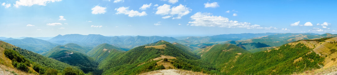 Beautiful view of the peaks of the Caucasus mountains on a Sunny day. Panorama