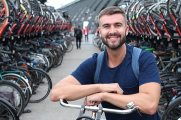 Joyful man in bicycle 3D parking lot