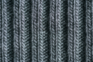 full frame image of grey knitted woolen fabric background