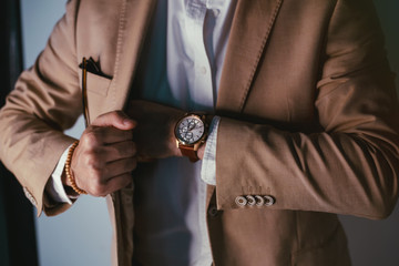 Suited man posing.Perfect to the last detail. Handsome young businessman .business and office...