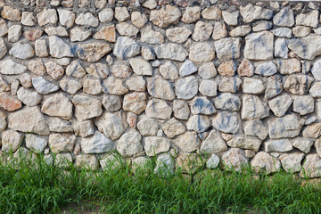 Stone wall with grass