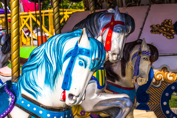 Obraz na płótnie Canvas Close Up Of Horses On Merry Go Round Carousel