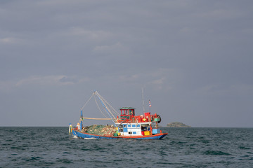 wooden local fisherboat at the ocean