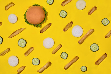 Design concept of mockup burger and french fries set on yellow background.