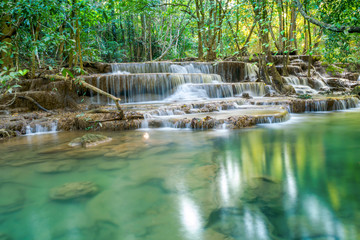 Naklejka premium The landscape photo, Huay Mae Kamin Waterfall, beautiful waterfall in autumn forest, Kanchanaburi province, Thailand