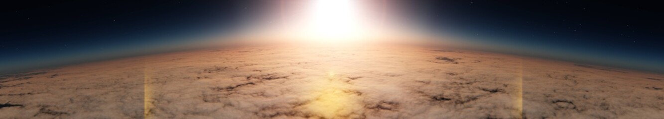 Sunrise over the planet. Panorama of clouds under the sun.
