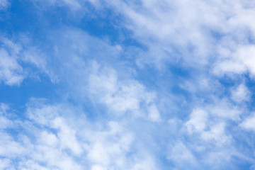 white fluffy clouds in the blue sky