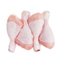Group of Raw chicken leg drumsticks isolated on a white background © Aleksei