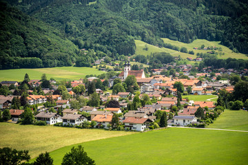 Fototapeta na wymiar Panoramic View over Aschau im Chiemgau from above in summer on a beautiful day