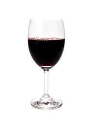 Red wine in glass isolated on white background.