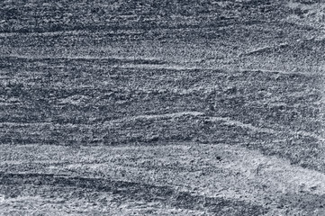 Migmatitic gneiss migmatite rock bands pattern grey light dark banded granite texture macro closeup...