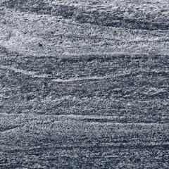 Migmatitic gneiss migmatite rock bands pattern grey light dark banded granite texture macro closeup...