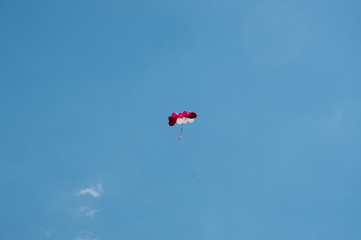 Background colorful balloons flying in the blue sky with clouds