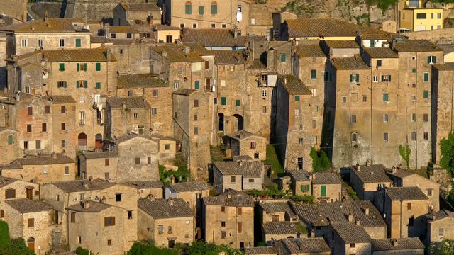 Houses of Sorano village in southern Tuscany. Panning shot