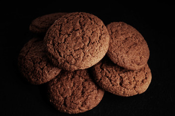 oatmeal cookies on a black table