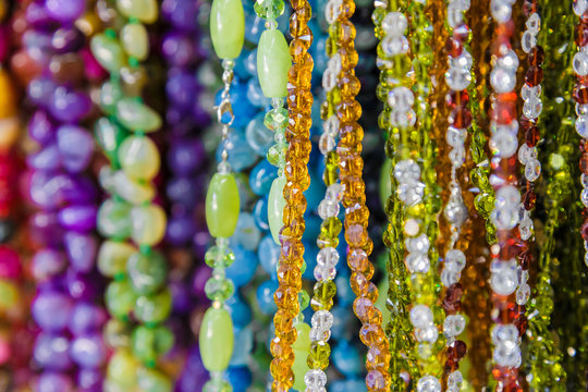 beautiful multicolor beads in necklace form, marvelous colorful beads in necklace form as background, texture.