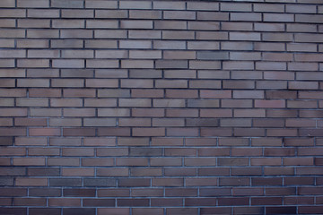 Old brick wall background. Grunge texture. Black wallpaper. Dark surface