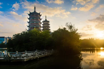 Fotobehang Sunrise over the pagodas in Guilin, China © creativefamily