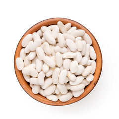Top view of wooden bowl full of white beans