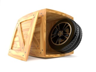 Car tire inside wooden crate