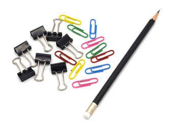 top view pencil with colorful paper clip, black paper clip. Desk office concept, copy space, isolated on white background