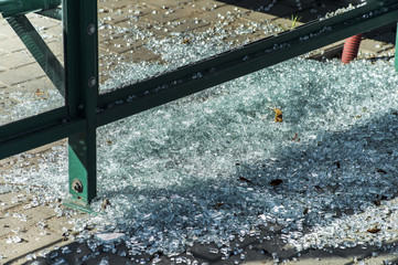 Broken glass at the bus stop