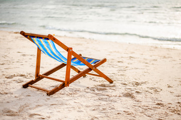 Fototapeta na wymiar beach chair on the beach.
