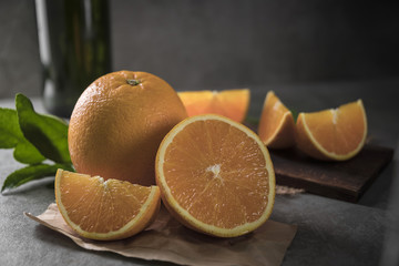 Beautiful, fresh orange on the dark background. Healthy sweet food concept.