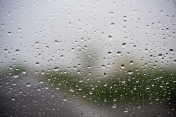 Rain drops on window glasses surface