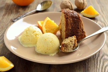 Orange cake with walnuts and ice cream