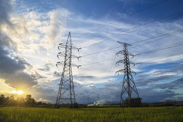 high voltage post,High voltage tower sky sunset background