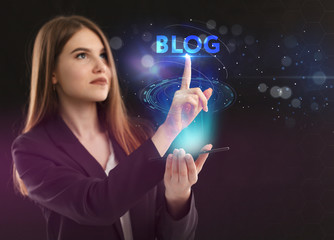 The concept of business, technology, the Internet and the network. A young entrepreneur working on a virtual screen of the future and sees the inscription: blog