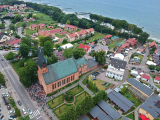 Aerial view on gathering of faithful people during devotion in church