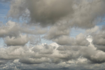 Light in the Dark and Dramatic Storm Clouds background