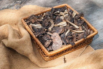 dried mushrooms, on a wooden table.