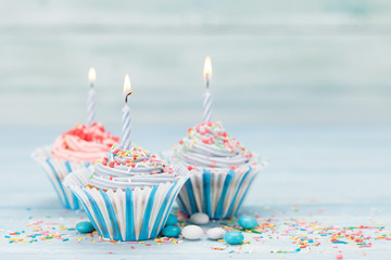 Sweet cupcakes with candles