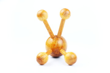 Reflexology Traditional Thai Massage tool, A wooden foot massage on a white background, isolate, wooden foot massage is a folk wisdom that Thai people. Popular Thai massage.