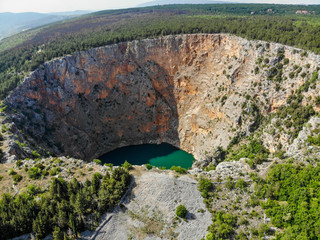 Red Lake (Croatian: Crveno jezero) is a collapse doline (collapse sinkhole) containing a karst lake...