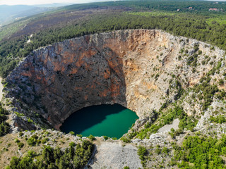 Red Lake (Croatian: Crveno jezero) is a collapse doline (collapse sinkhole) containing a karst lake...