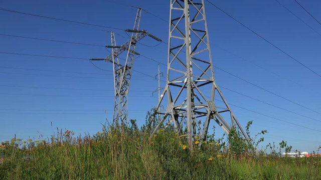 High voltage transmission power line with glass isolators.