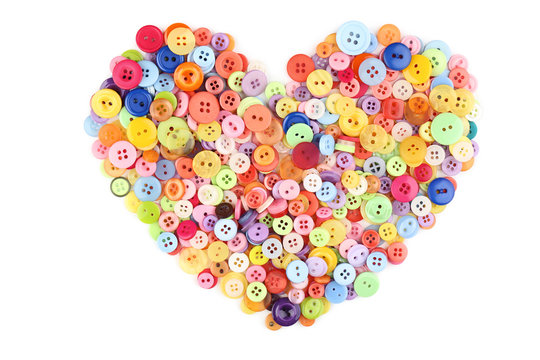 Colorful Sewing Buttons In Heart Shape On White Background