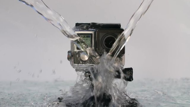 Donetsk, Ukraine - May 11, 2018 Water is pouring down on the action camera