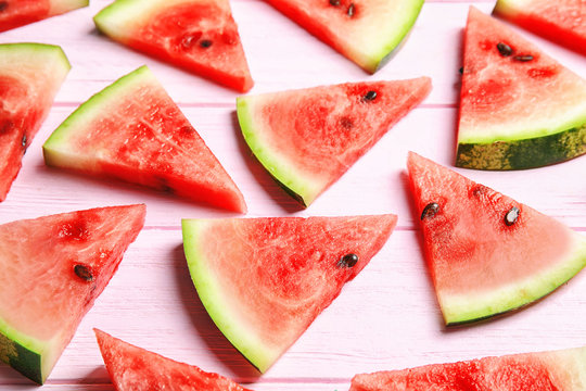 Composition with watermelon slices on wooden background