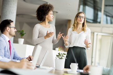 Business people discussing a strategy and working together in office